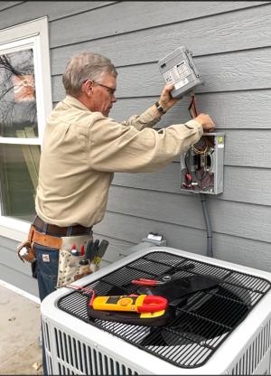 man installing equipment